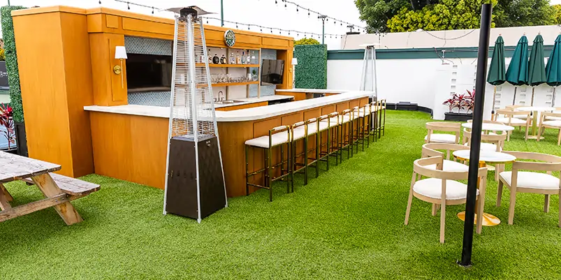 Artificial turf cut around a series of cement squares